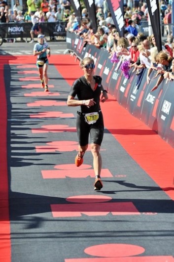 Emma running in a half ironman race